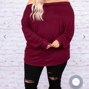 Women’s size 2X sweater made byChic Soul. Beautiful red color.